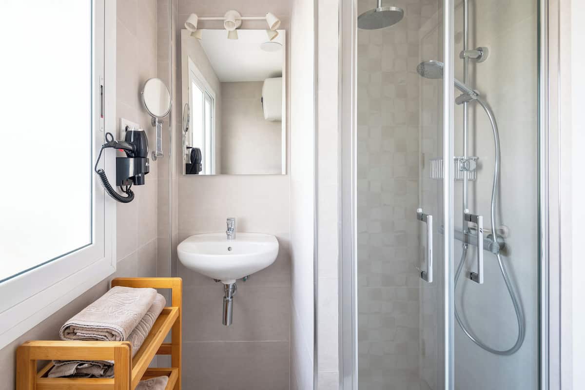 1 bedroom, down comforters, blackout drapes, iron/ironing board