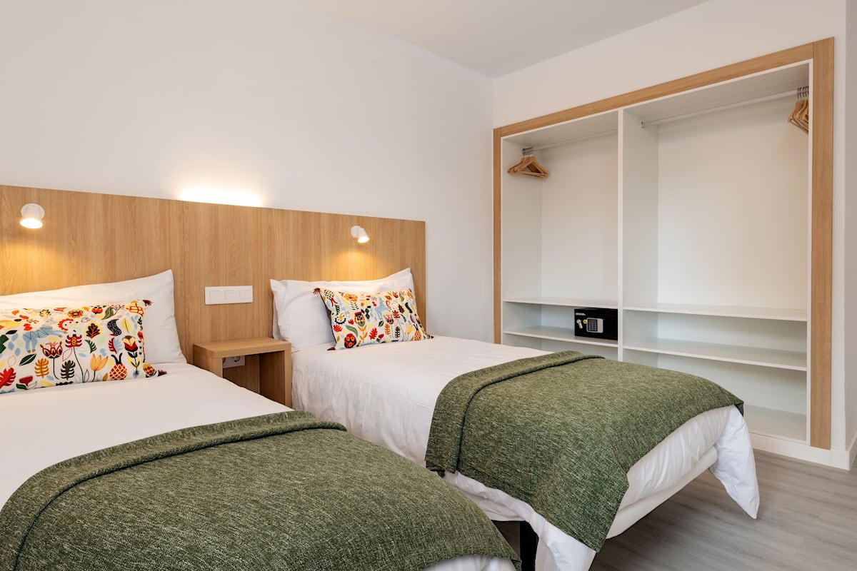 1 bedroom, down comforters, blackout drapes, iron/ironing board