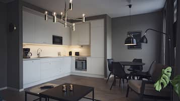 Two Room Superior Apartment | Private kitchen | Fridge, microwave, oven, stovetop