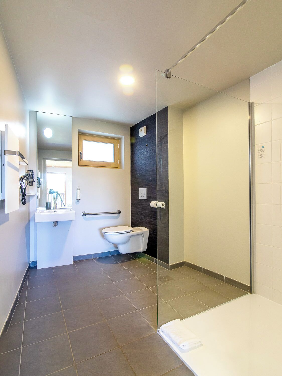 premium twin room | bathroom | shower, hair dryer, towels, soap