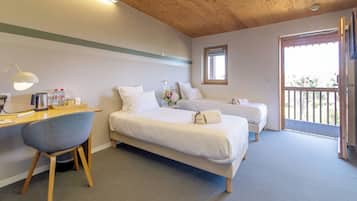 Habitación Premium con 2 camas individuales | Ropa de cama de alta calidad y colchones viscoelásticos