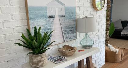 Across the road from the beach and 3 minutes walk to vibrant Peregian Village