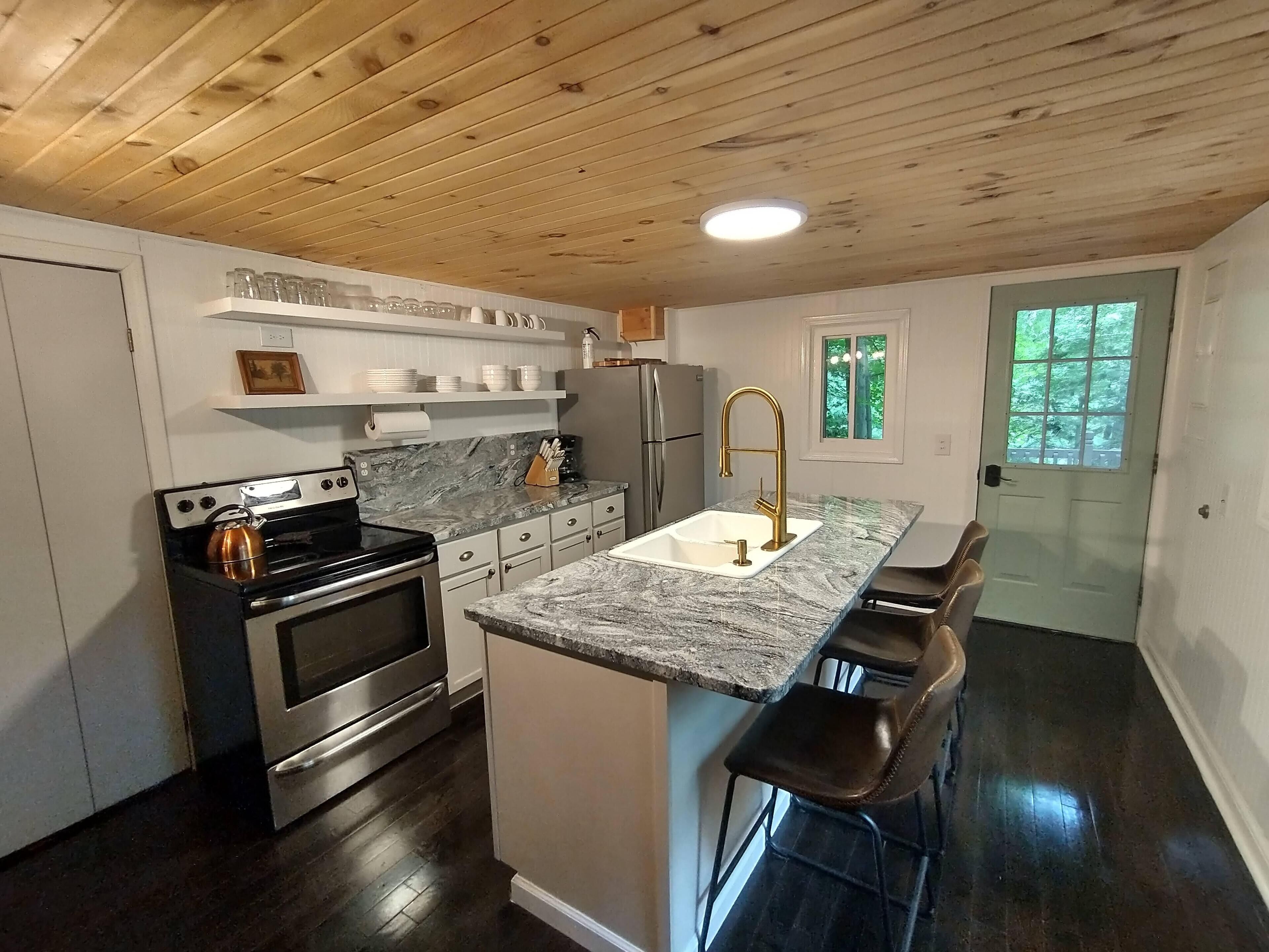 TWO CABINS directly across gravel road, private community lake, peaceful woods