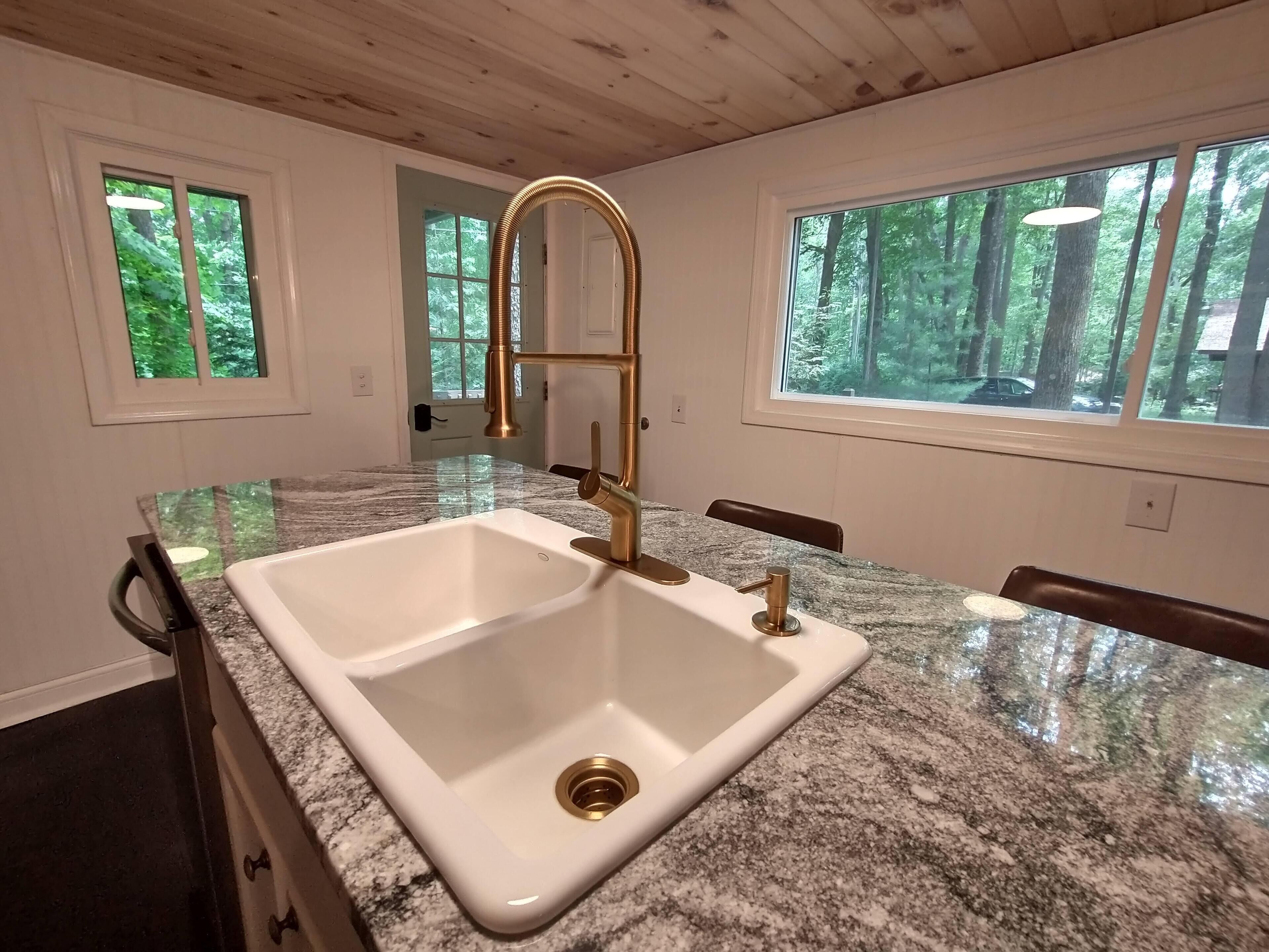 TWO CABINS directly across gravel road, private community lake, peaceful woods