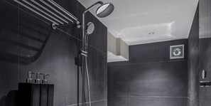 Separate tub and shower, rainfall showerhead, free toiletries