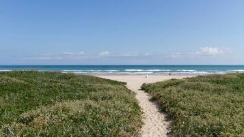 On the beach, beach towels