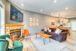 Smart TV, fireplace, books