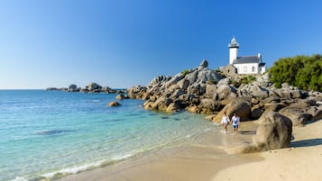 Plage, chaises longues