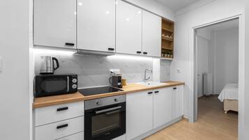 Apartment | Private kitchen | Full-size fridge, coffee/tea maker, electric kettle, toaster