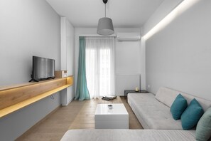 Apartamento | Zona de estar | Una televisión de pantalla plana