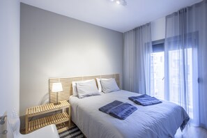 City-Apartment, 2 Schlafzimmer | 2 Schlafzimmer, Verdunkelungsvorhänge, schallisolierte Zimmer
