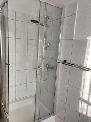 Shower, hair dryer, towels, soap