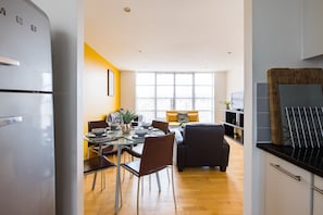 Comfort Apartment | Living area | Flat-screen TV