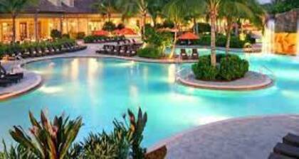 2 Bedroom + Den overlooking the Golf Course with Heated Salt Water Pool