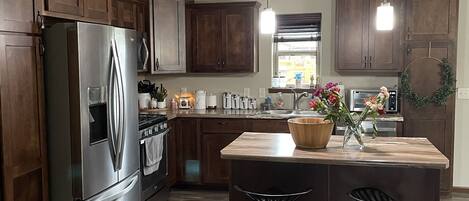 Fridge, microwave, dishwasher, coffee/tea maker