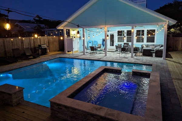 LED lights bring the pool alive at night!
