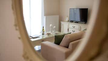 Deluxe Apartment, 2 Bedrooms | Living area | 42-inch LCD TV with digital channels, TV, Netflix