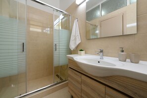 City Apartment, 1 Bedroom | Bathroom | Combined shower/tub, hydromassage showerhead, free toiletries - Nostalgia Corfu Town Apartments (Corfu)