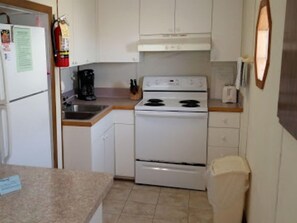 Microwave, dishwasher, coffee/tea maker, cookware/dishes/utensils