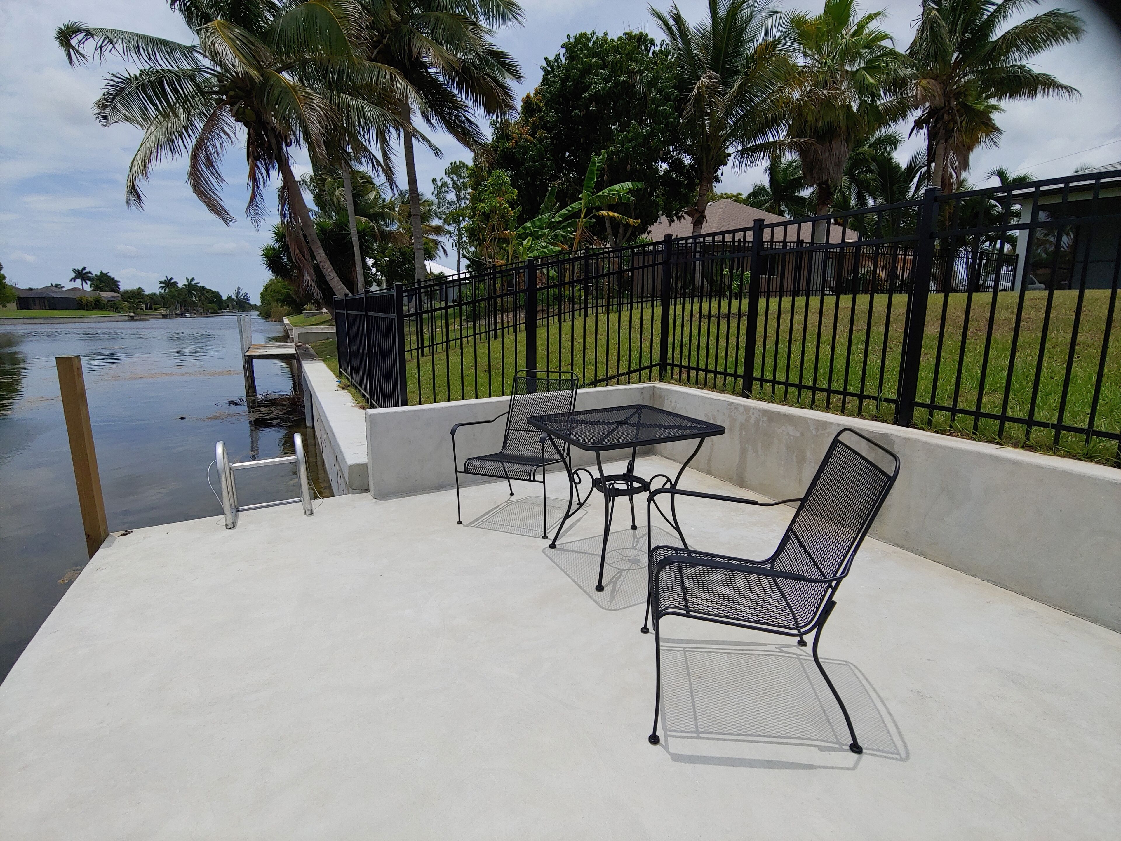 A 4-bedroom pet-friendly  home on a fresh water  canal with a fenced yard