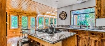 Dog-friendly creekside home with entertainment barn, private hot tub & firepit