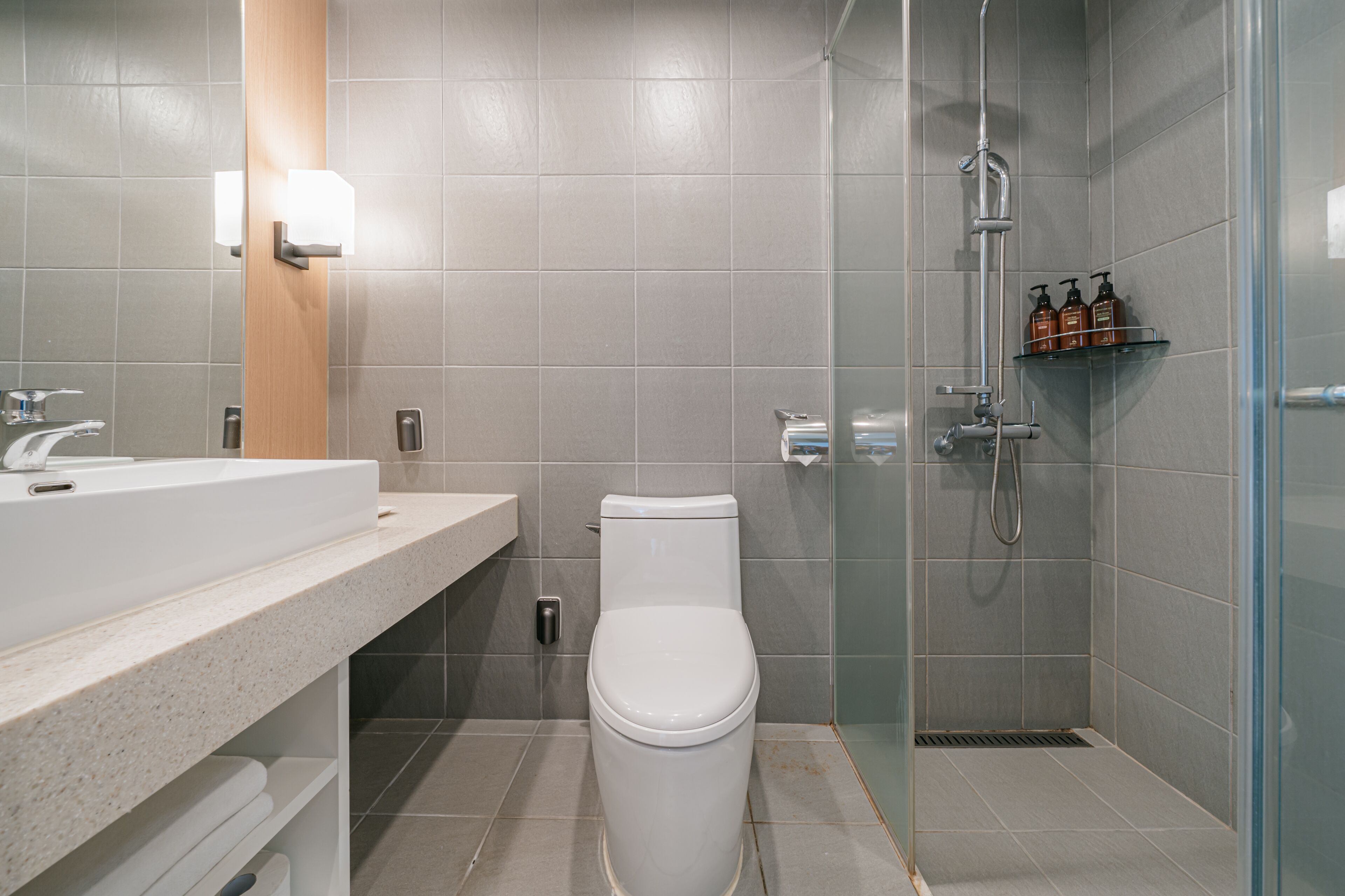 shower, eco-friendly toiletries, hair dryer, slippers