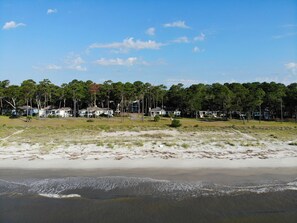 On the beach, sun-loungers, beach towels