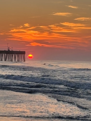 Top Floor Suite of classic 1940's Beach Cottage with porch & partial ocean view.