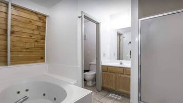 Shower, jetted tub, hair dryer, towels