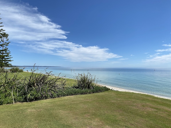 On the beach, sun loungers, beach umbrellas, beach towels - Sea'esta Sands - Absolute Beachfront Property (Siesta Park)