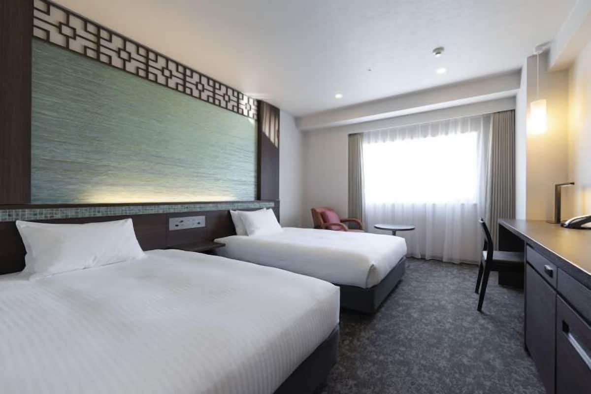 Desk, laptop workspace, free WiFi, bed sheets