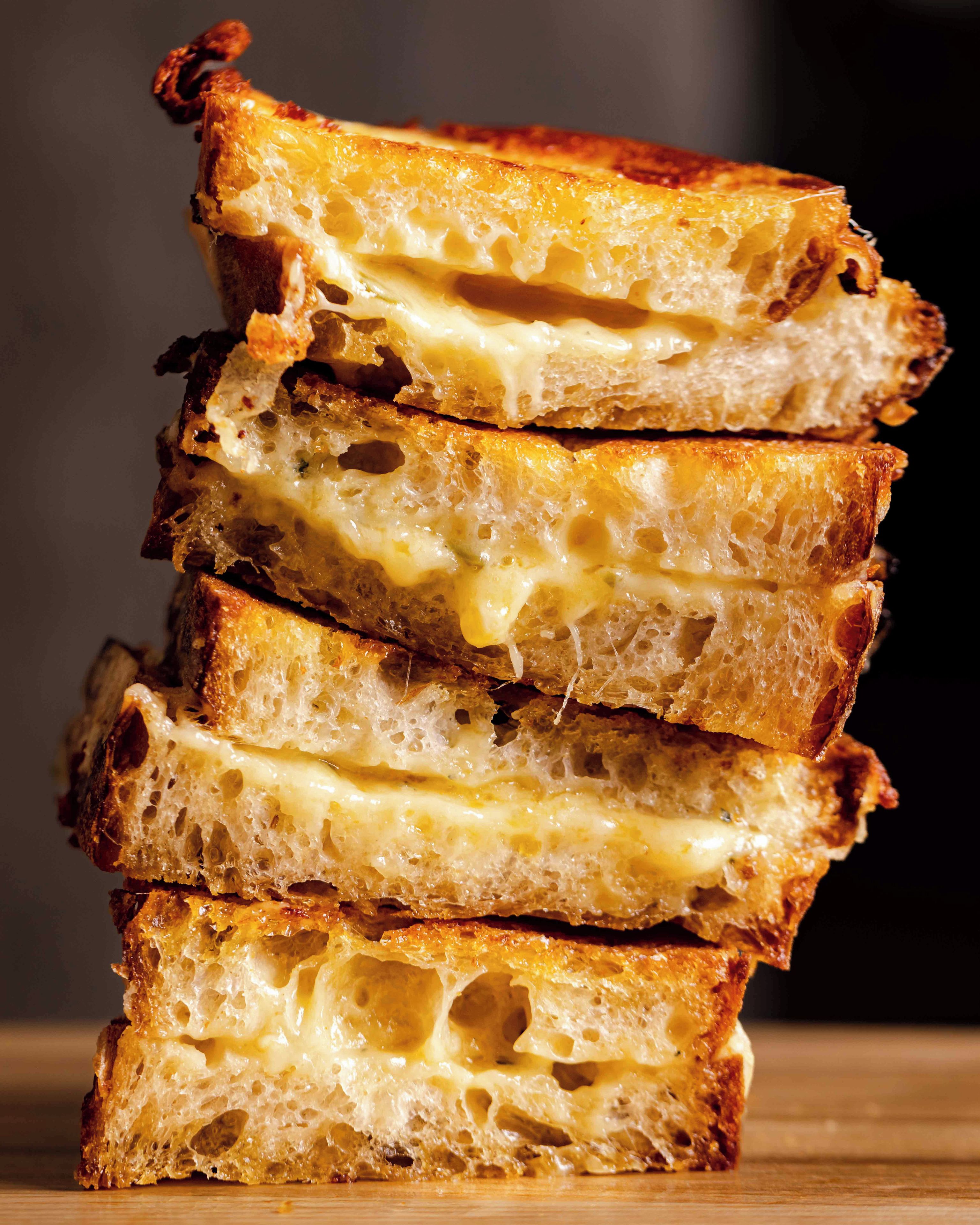 A stack of grilled cheese sandwiches.