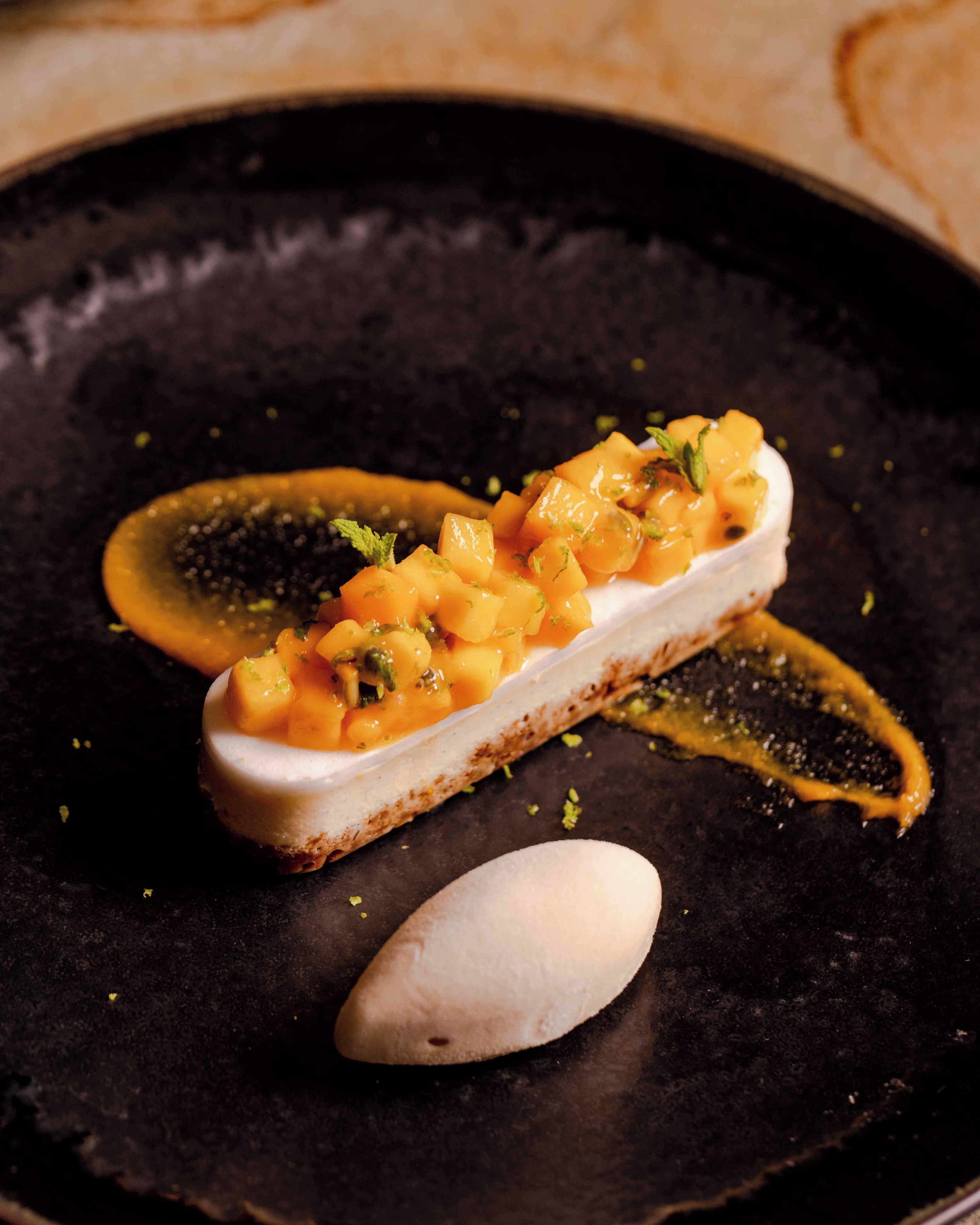 A dessert with a scoop of ice cream on a plate.