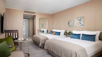 Hypo-allergenic bedding available, down comforters, minibar