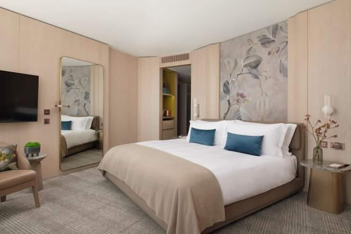 Hypo-allergenic bedding available, down comforters, minibar