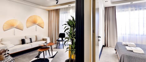 Superior Suite, Balcony | Living area | 40-inch LCD TV with satellite channels, TV