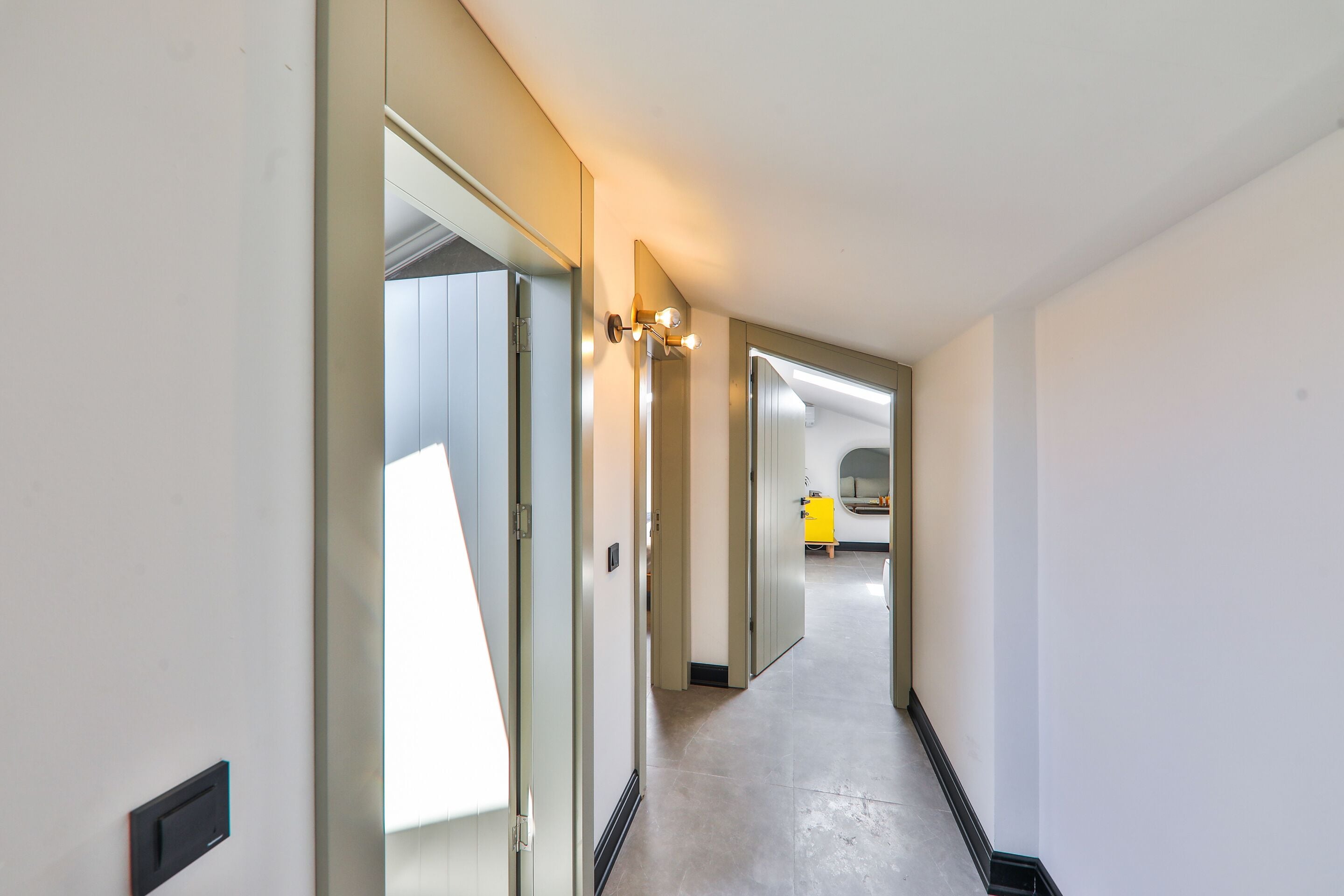 economy loft | premium bedding, free minibar items, desk, laptop workspace