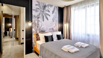 Family Suite, 2 Bedrooms, Balcony | Premium bedding, free minibar items, desk, laptop workspace