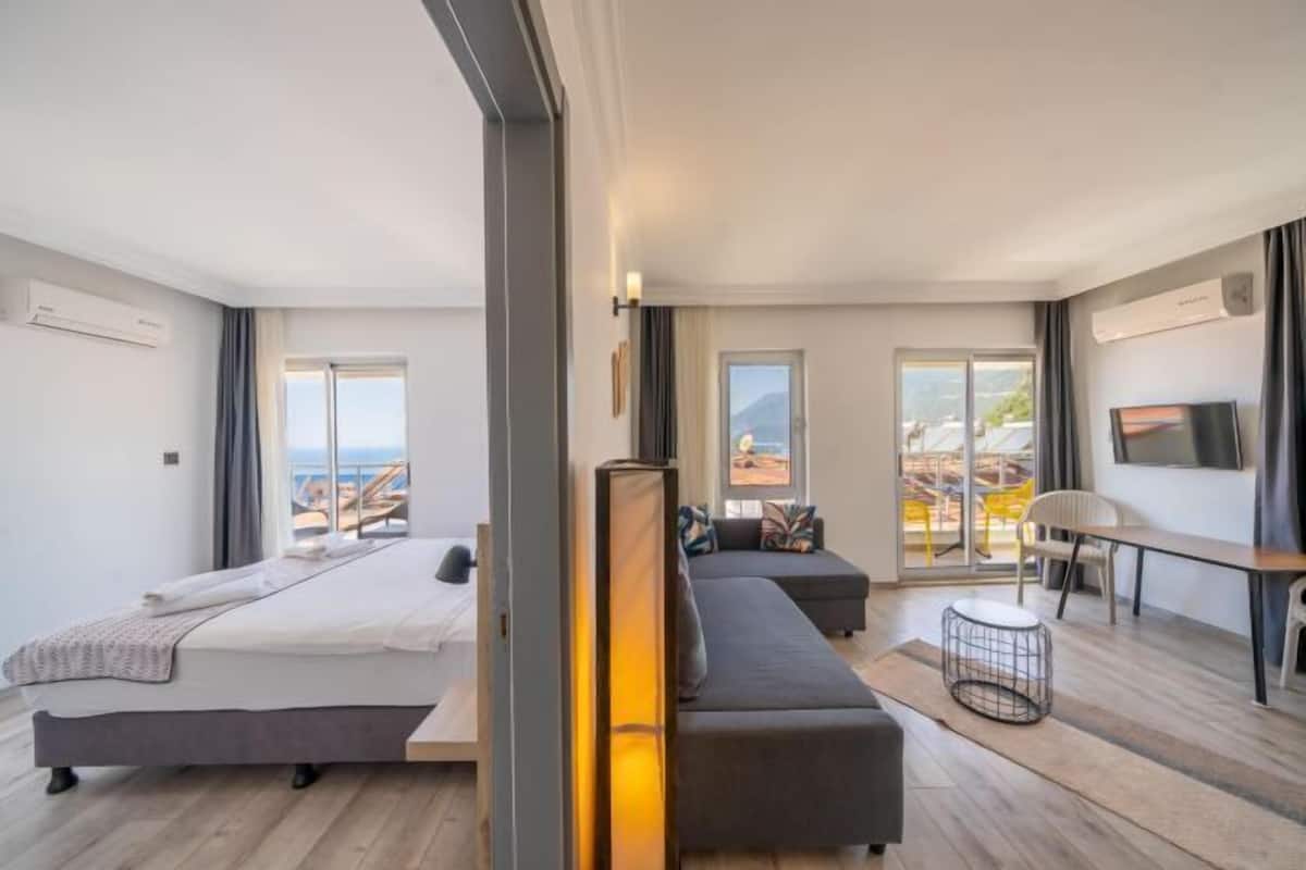 Premium bedding, desk, laptop workspace, soundproofing