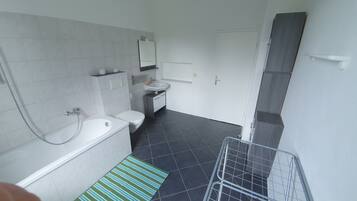 Kombination af bruser/badekar, Toiletpapir