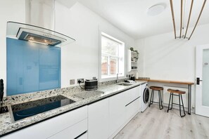 Fridge, microwave, oven, cookware/dishes/utensils