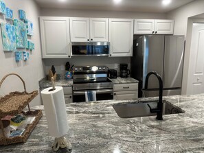 Coffee/tea maker, fridge, microwave, oven - Stunning Views at Mariner Pointe 541 (Sanibel)