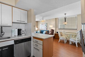 Enjoy a comfortable dining experience in this well-appointed kitchen area with modern appliances and a casual dining space.