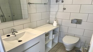 Bathtub, hair dryer, towels