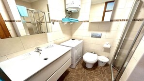 A compact bathroom with a sink, toilet, and shower. - Welooveyou Volans B30 (Costa Calma (incl. Urbanización Cañada del Río))
