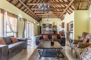 Luxury House (for 8) | Living area | Flat-screen TV - Zebula Golf Estate & Spa Executive Villas (Bela-Bela)