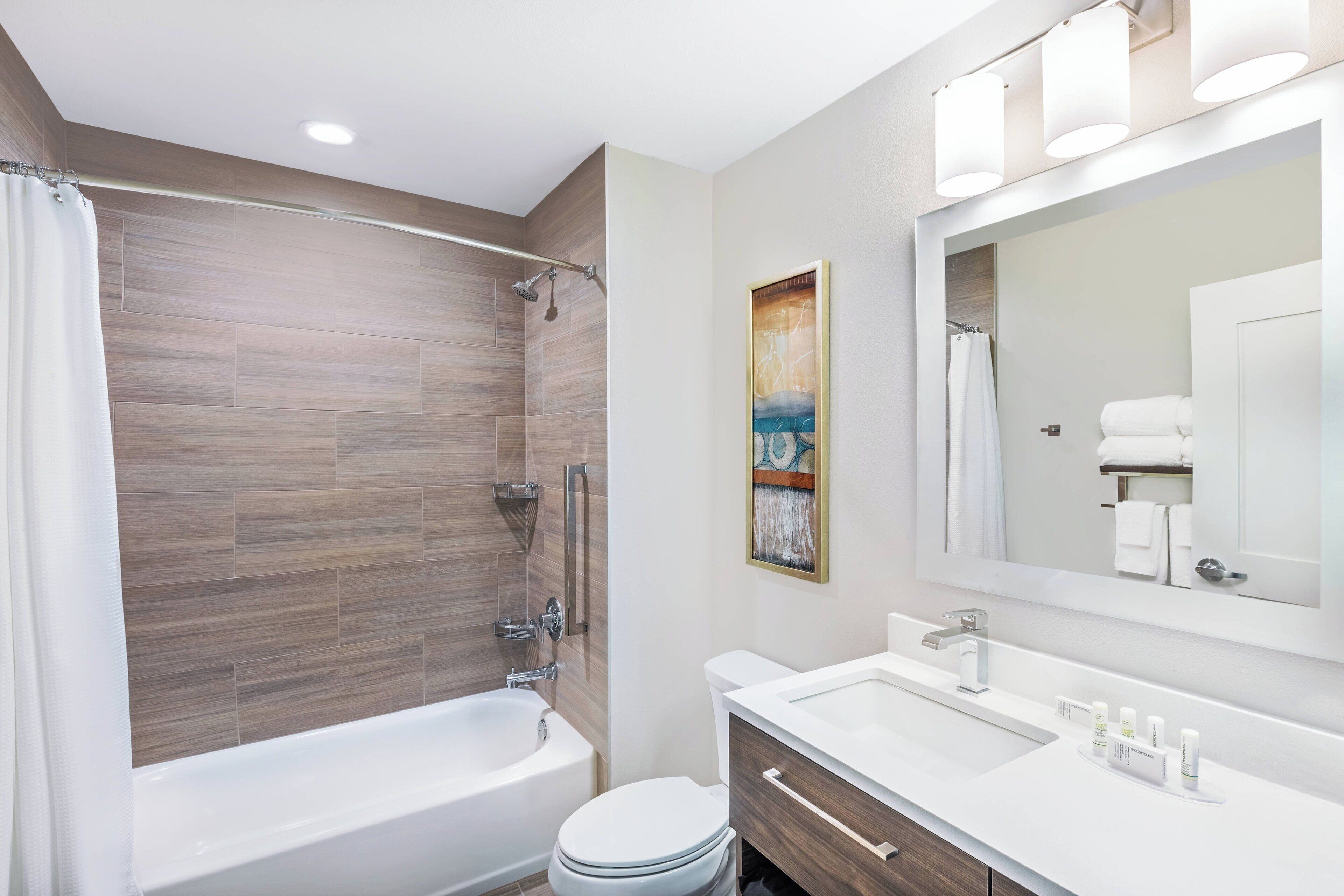 combined shower/bathtub, free toiletries, hair dryer, towels