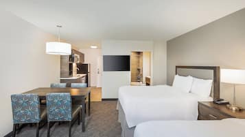 Desk, laptop workspace, iron/ironing board, free cribs/infant beds