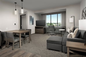 Premium bedding, desk, laptop workspace, soundproofing