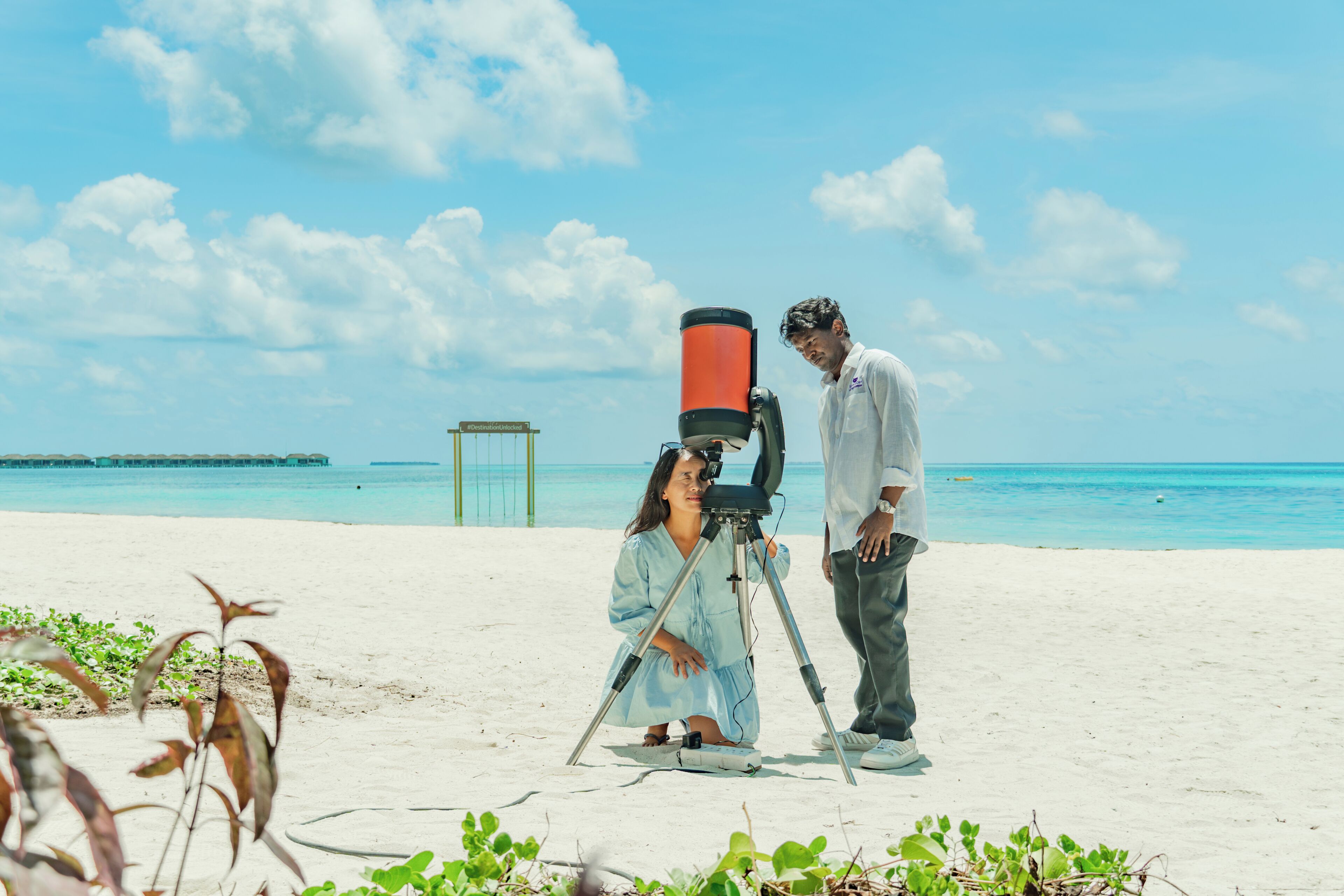On the beach, white sand, sun-loungers, beach umbrellas